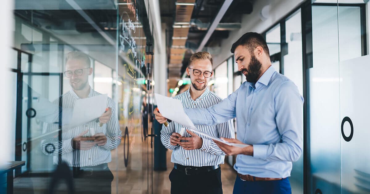 Business professionals reviewing a strategy together